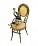 Cat singer with a guitar on a chair RWG9KR